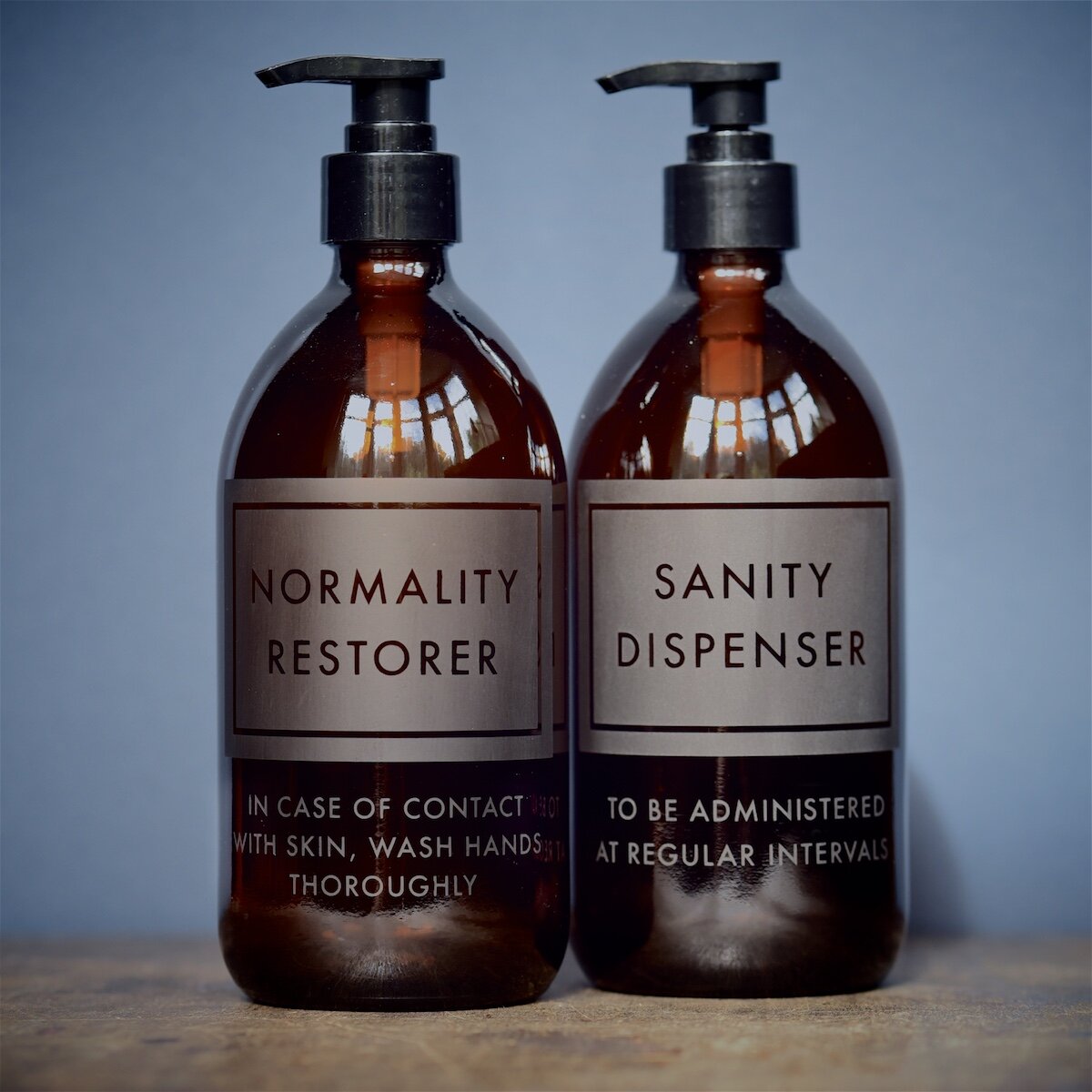 refillable glass bottles from vinegar and brown paper