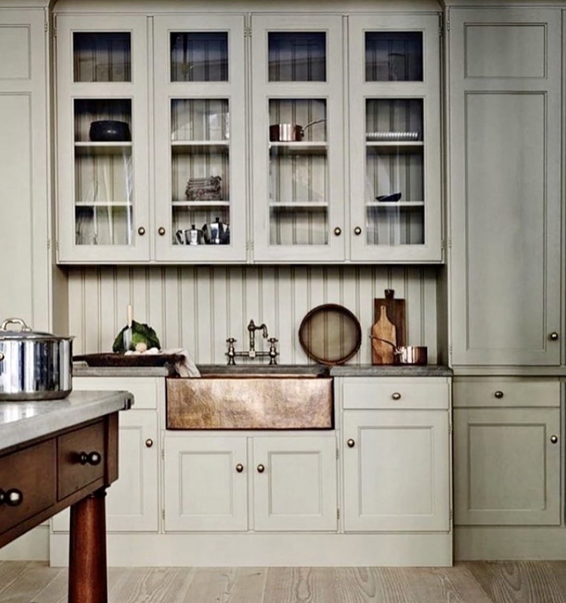 tongue and groove kitchen by kitchenandbeyond.se with copper sink
