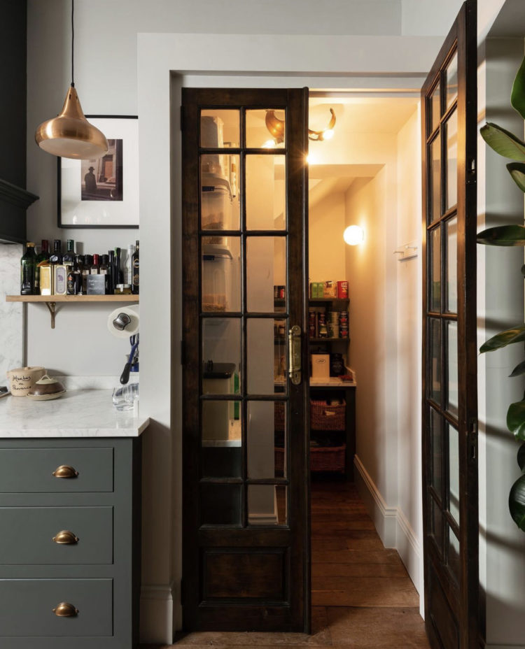 glazed doors over under stairs space by devol